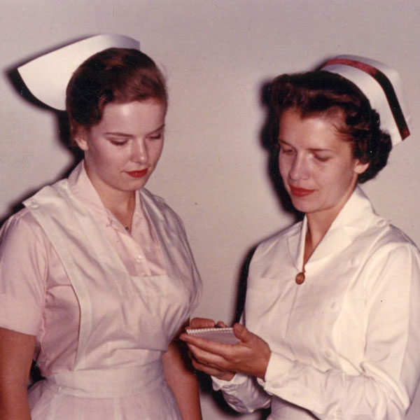 Student Nurse Kristin Lyons with Nurse, Color, SUNY Upstate College of Nursing
